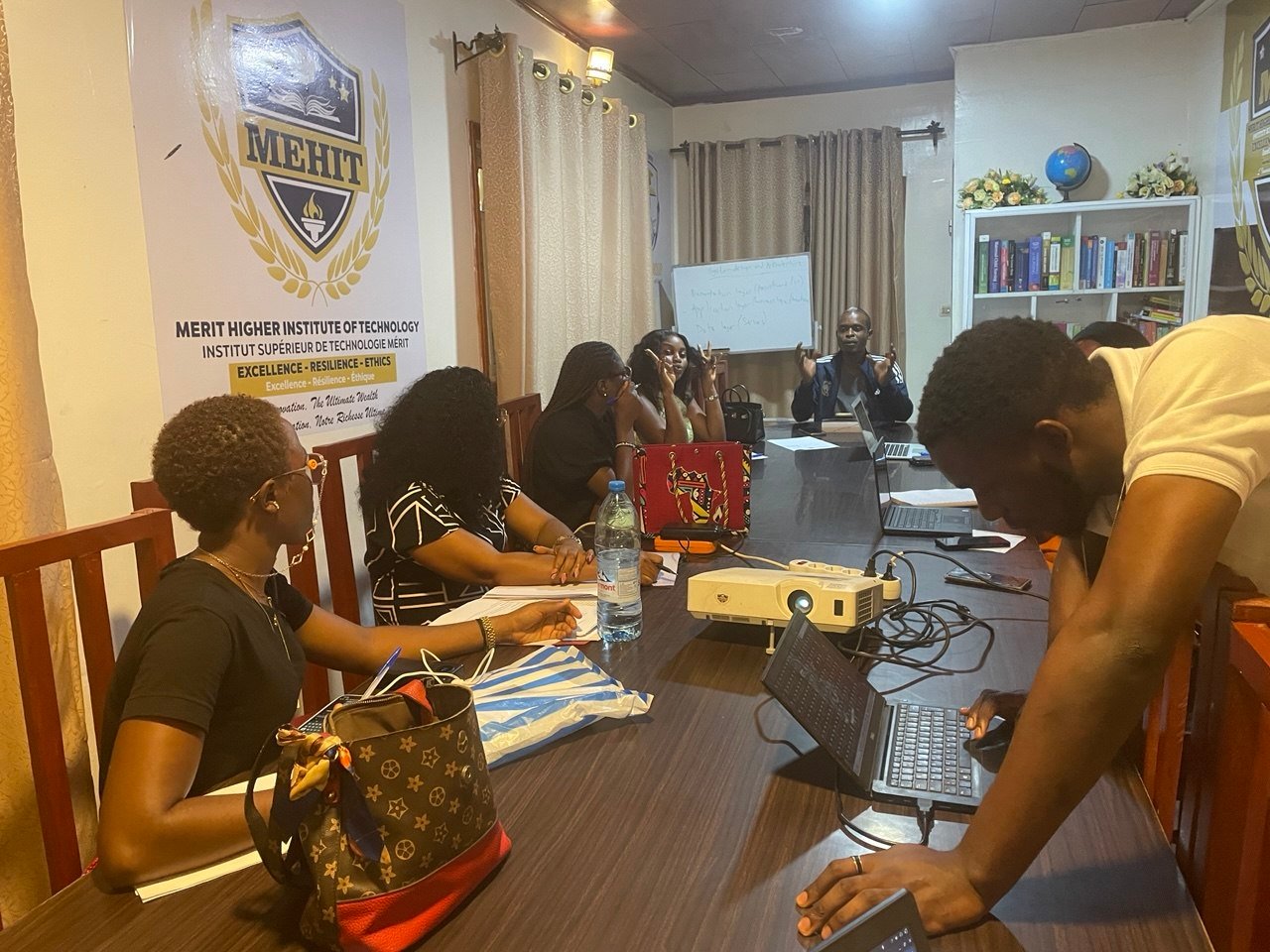 Graduate students applying professional knowledge during a practical learning session