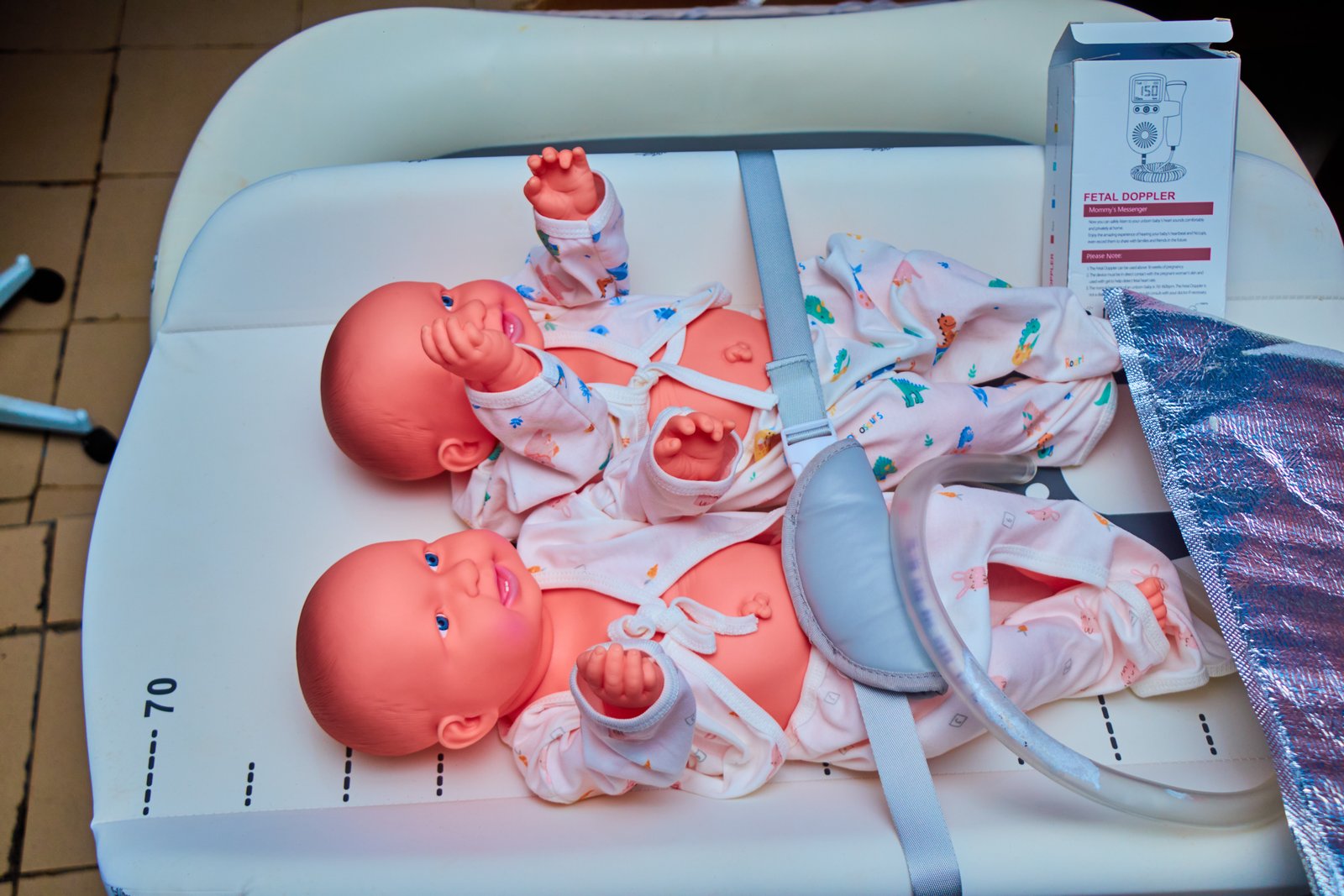 Students participating in a maternity ward simulation