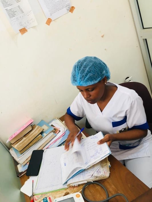 Student midwife receiving practical newborn care training